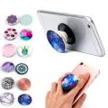  PopSocket es un accesorio que funciona como sujetador y base para sus equipos m
